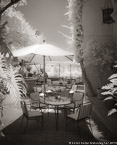 Cafe , Positano Italy #YNL-900.  Infrared Photograph,  Stretched and Gallery Wrapped, Limited Edition Archival Print on Canvas:  40 x 50 inches, $1560.  Custom Proportions and Sizes are Available.  For more information or to order please visit our ABOUT page or call us at 561-691-1110.