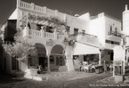 Cafe , Mykonos Greece #YNL-535.  Infrared Photograph,  Stretched and Gallery Wrapped, Limited Edition Archival Print on Canvas:  56 x 40 inches, $1590.  Custom Proportions and Sizes are Available.  For more information or to order please visit our ABOUT page or call us at 561-691-1110.