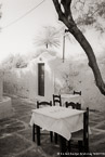 Cafe , Mykonos Greece #YNL-543.  Infrared Photograph,  Stretched and Gallery Wrapped, Limited Edition Archival Print on Canvas:  40 x 60 inches, $1590.  Custom Proportions and Sizes are Available.  For more information or to order please visit our ABOUT page or call us at 561-691-1110.
